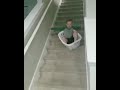 Kid Regrets Decision of Sliding Down Stairs in Laundry Basket - 1040639