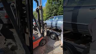 More forklift safety violations. Getting another car ready for the long black train. #jaguar #xj8