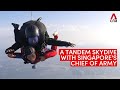 Cnas grace yeoh tandem jumps 10000 feet with chief of army for the saf