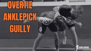 The Overtie: Ankle Picks, Trips & Front Headlock Attacks