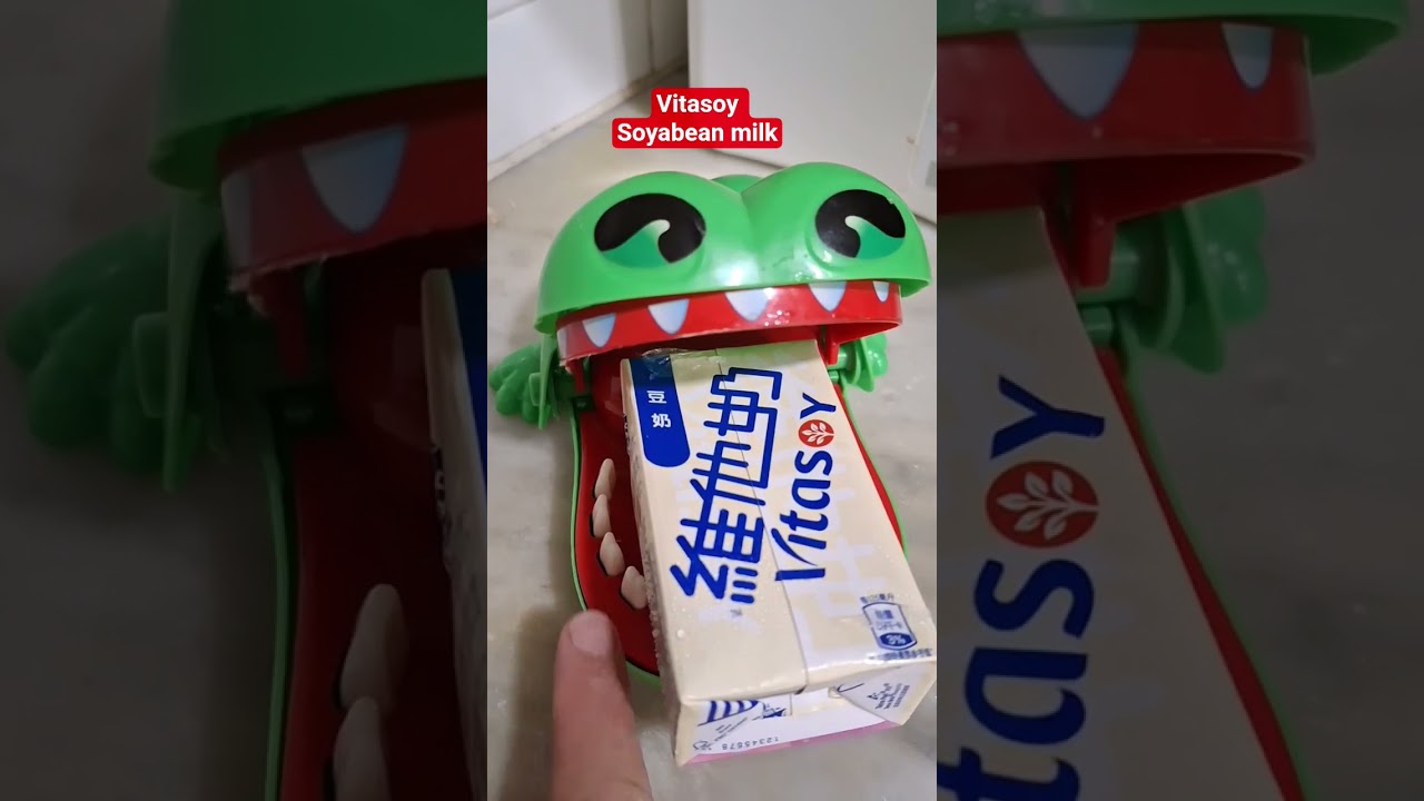 Crocodile dentist bites Vitasoy Soyabean milk 