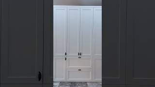 Fitted kitchen storage unit with pocket doors