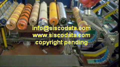 Fabric roll robot sorting on ID scanning for different packaging -