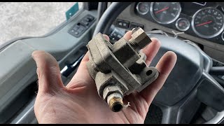 Fixing a brake relay valve on the trailer