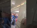 Plane door opens mid air