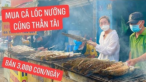 Hốt tiền ngày vía Thần Tài bán hơn 3,000 cá lóc nướng trui, nướng cả đêm mà không kịp!