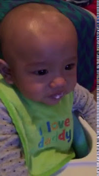Funny baby Luth first yoghurt