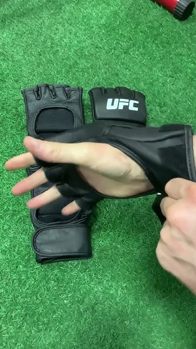 Бойцовские перчатки для ММА от UFC, отлично садится в руку фиксируя ...
