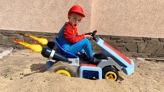 power wheels mario car stuck in the sand tractor hurry up to help