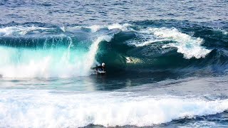 Two Bodyboarders Alone on a Remote and Isolated Slab