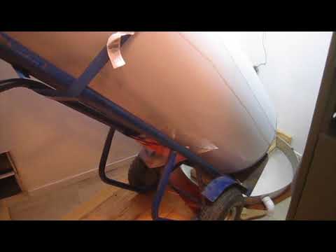 How to install a water heater drain pan without crushing it