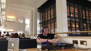 DJ sneaks into LIBRARY and PERFORMS.