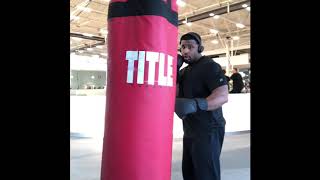 Michael Jai white little brother kicks punching bag of chain!!