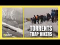 Sudden Flood Traps Hikers on Mountain Trail as Torrents Surround Them