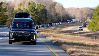 Plains streets full as Jimmy Carter motorcade makes way to Maranatha Baptist Church