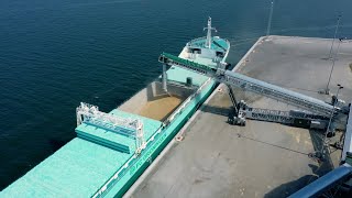 Telestack TB52 AWT Shiploader & TL24 Link Conveyor loading grains to coaster/panamax vessels.