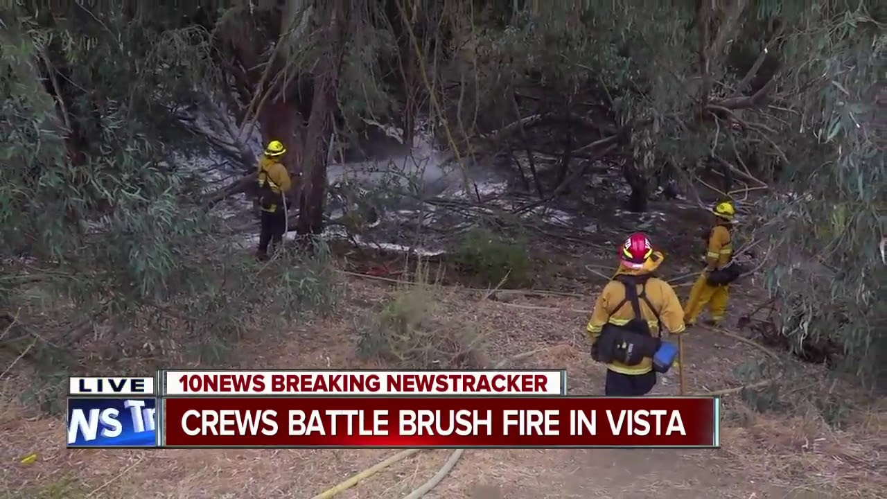 Crews battle brush fire in Vista - YouTube