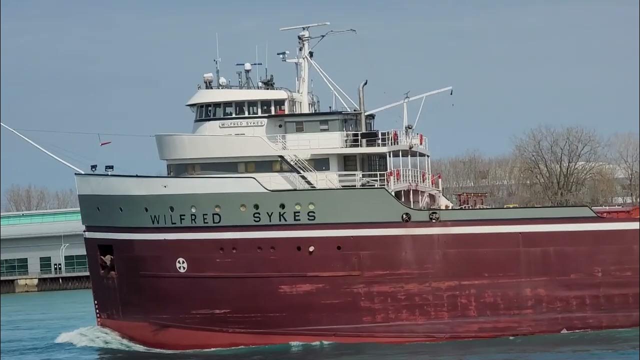 Amazing Grace being played on bagpipes by a crew member on the Wilfred Sykes Great lakes ship