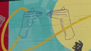 Artists Paint Mural In Denver's RiNo Neighborhood To Highlight Disability Rights
