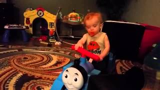 1 year old baby falls asleep riding his train - TOO FUNNY by Brad Alexander 382 views 9 years ago 20 seconds
