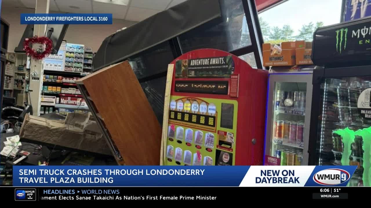 Semi truck crashes through store at Londonderry travel plaza