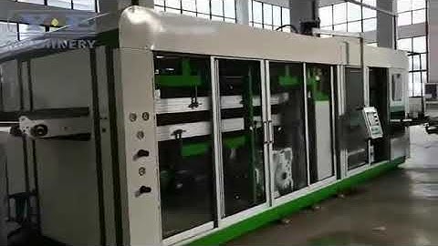 Tilt mold thermoforming machine with packing