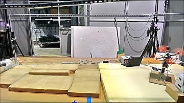 Time-optimal landing of a quadrotor onto a moving platform