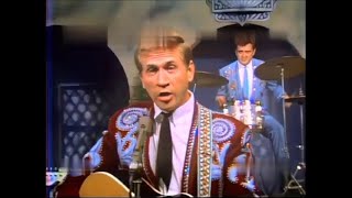 Watch Buck Owens Let The World Keep On A Turnin video