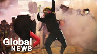 Hong Kong protests continue as riot police present