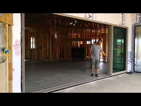 Western moving glass wall system