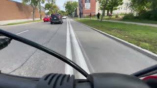 Professional Driver crosses solid bike lane.