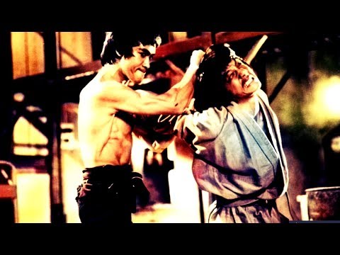 Video: Leej Twg Muaj Zog Dua - Bruce Lee Lossis Jackie Chan?