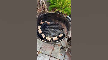Smoking meat made easy: building a charcoal snake on a Weber grill