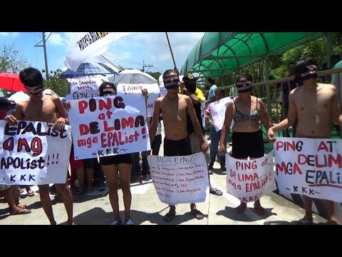 Naked protesters slam gov't circus - YouTube