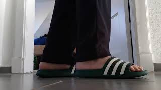 Daddy is walking and playing barefoot in his Adidas bath sandals 