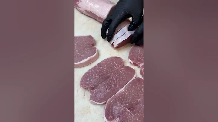 The Silver Fox Butcher slices pork loin into butterfly chops & roast. Watch the skillful cut!