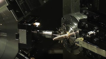 This 9 axis machine is completely bonkers - well done Tornos