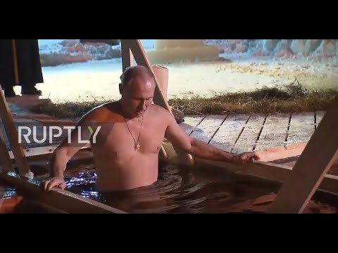 Russia: Putin braves ice-cold water for Epiphany dip
