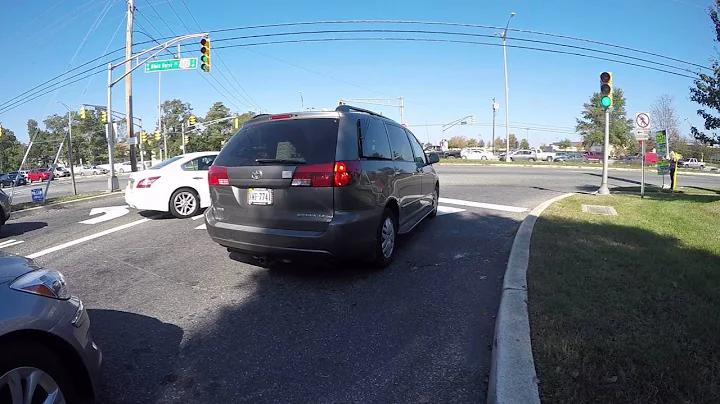 WHITE NISSAN NY PLATE HHZ-3728: CARELESS DRIVING