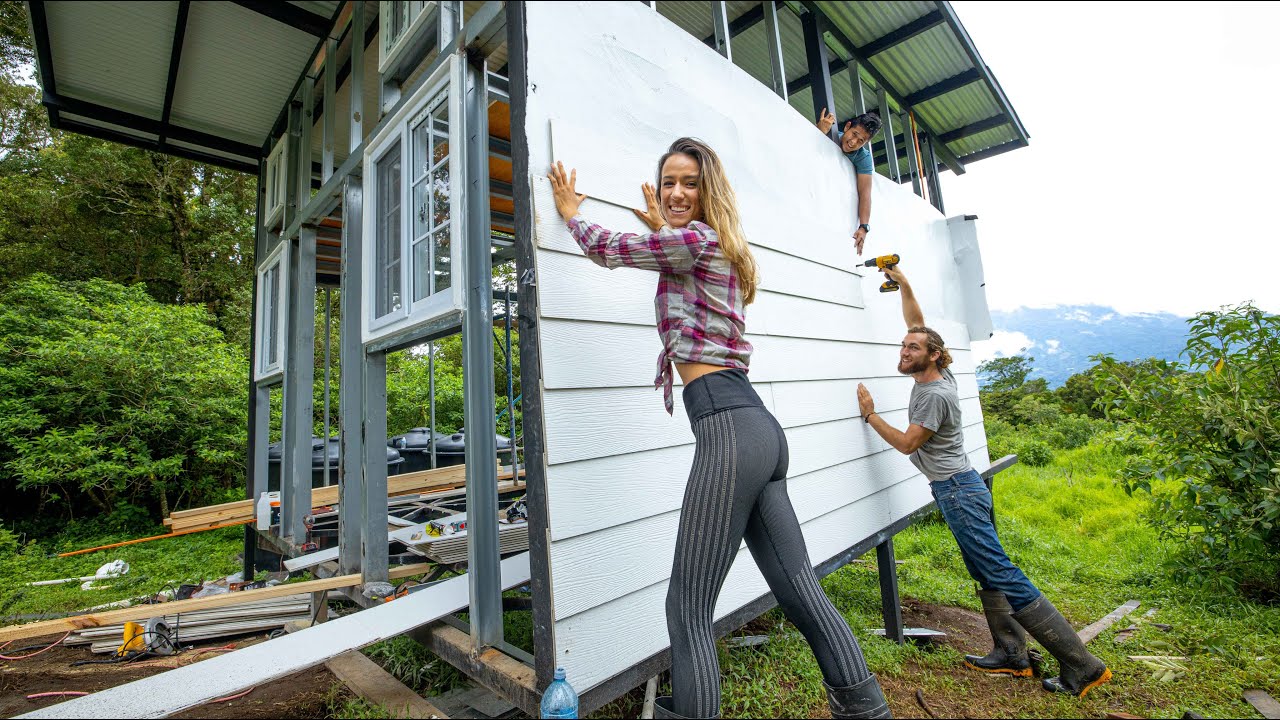 THIS IS A STRUGGLE // siding our off grid workshop - YouTube