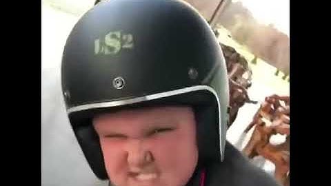Fat kid on a dirt bike