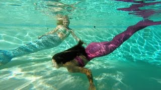 Video thumbnail of "Women Become Mermaids For The Day"