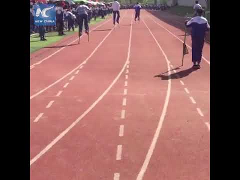 Super fast: Teenager stands out during stilt race in Guizhou, China