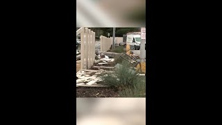 Pregnant woman injured in crash after driving through fence, striking utility pole