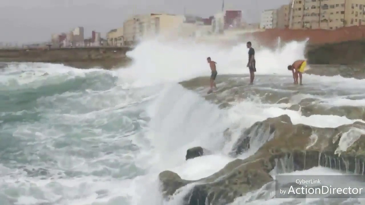 crazy swimming in big wave