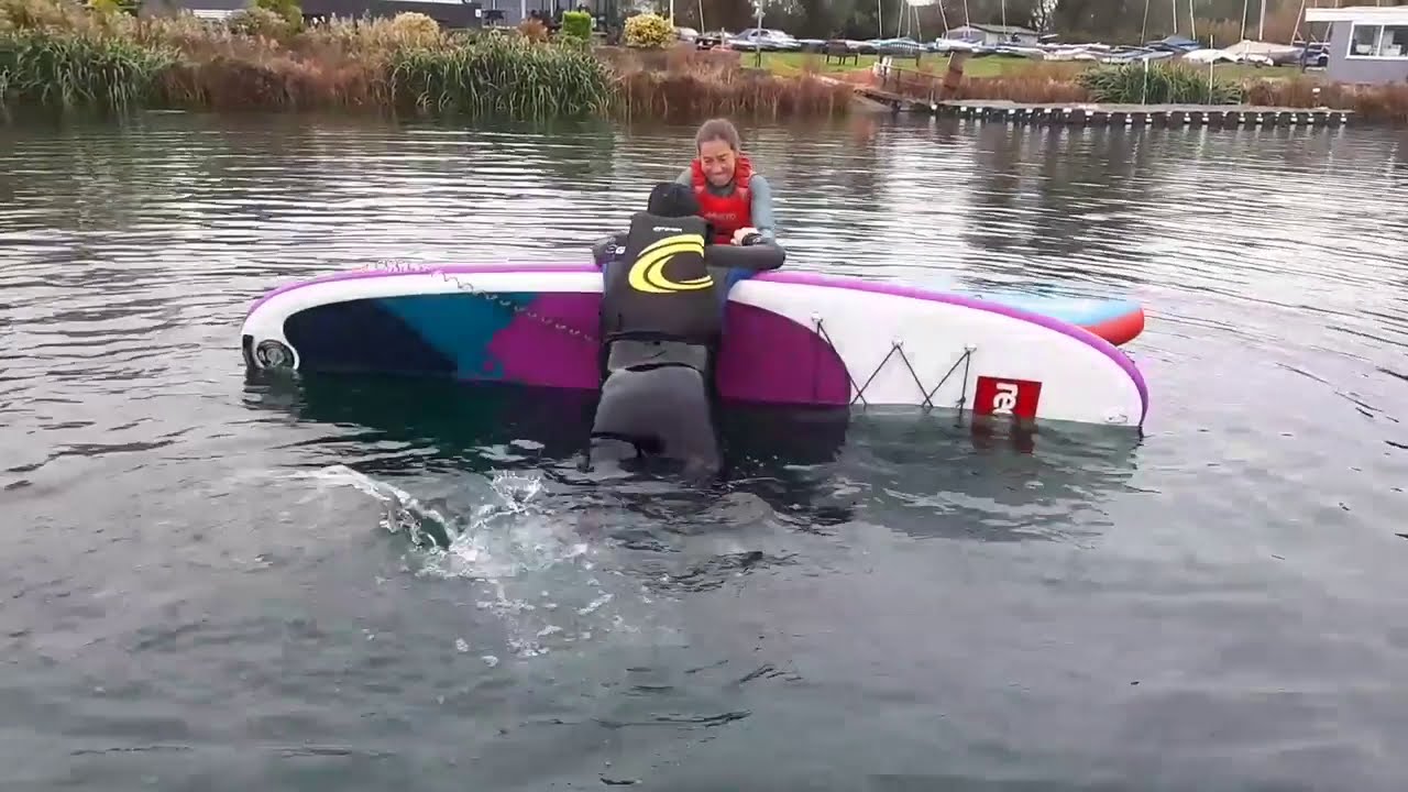 Rescuing another paddler on paddleboards