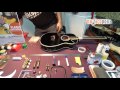 Cómo arreglar un puente de guitarra acústica