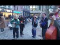 Music group plays at the market Vredenburg in Utrecht