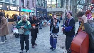 Music group plays at the market Vredenburg in Utrecht