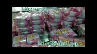 Automatic flow packing machine for multi breads